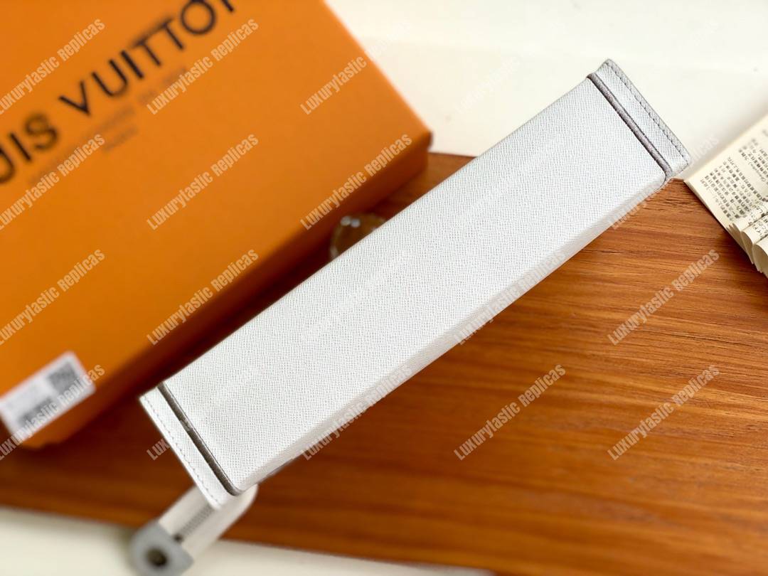 LV Pochette Voyage MM Taiga Leather White