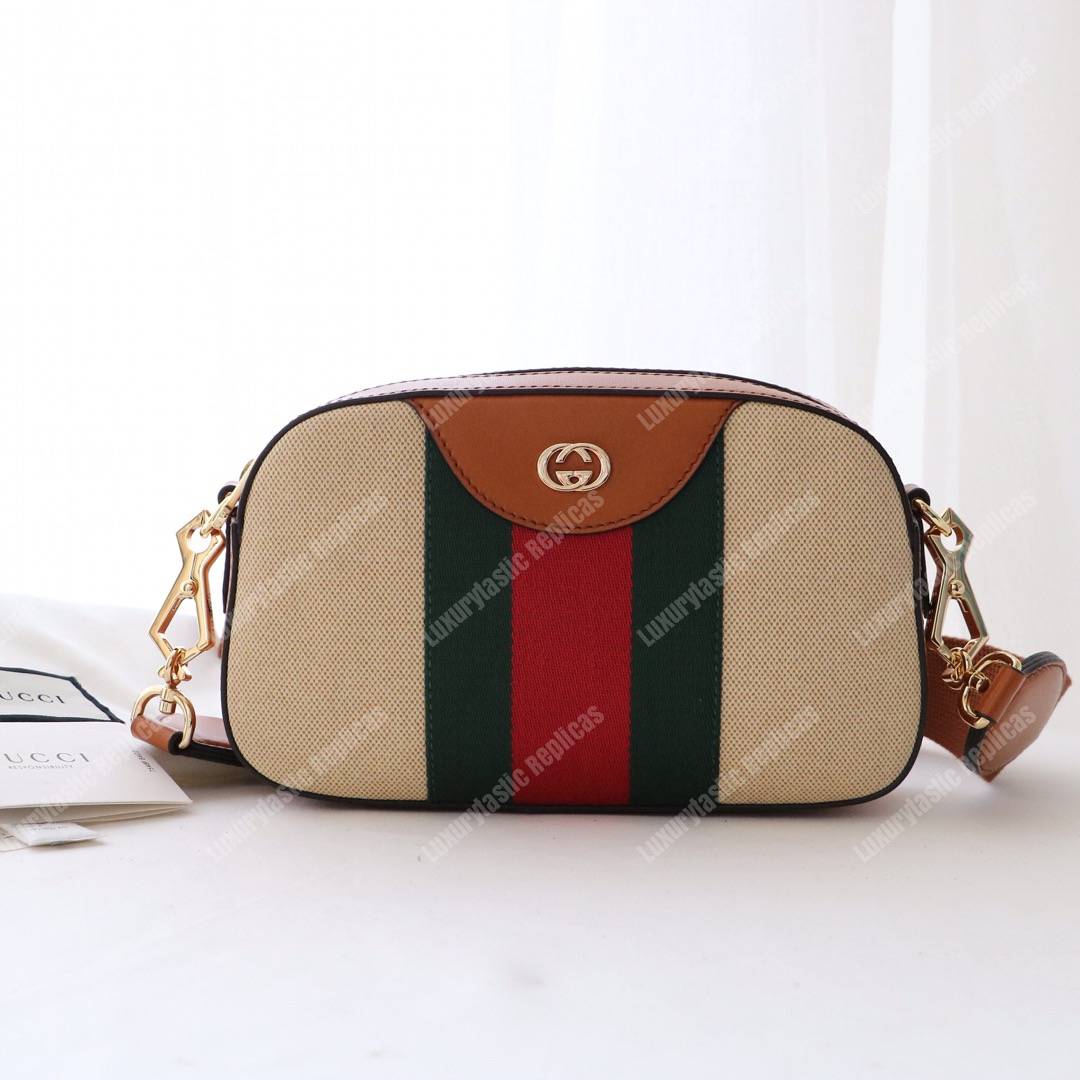 G*u*i vintage canvas shoulder bag