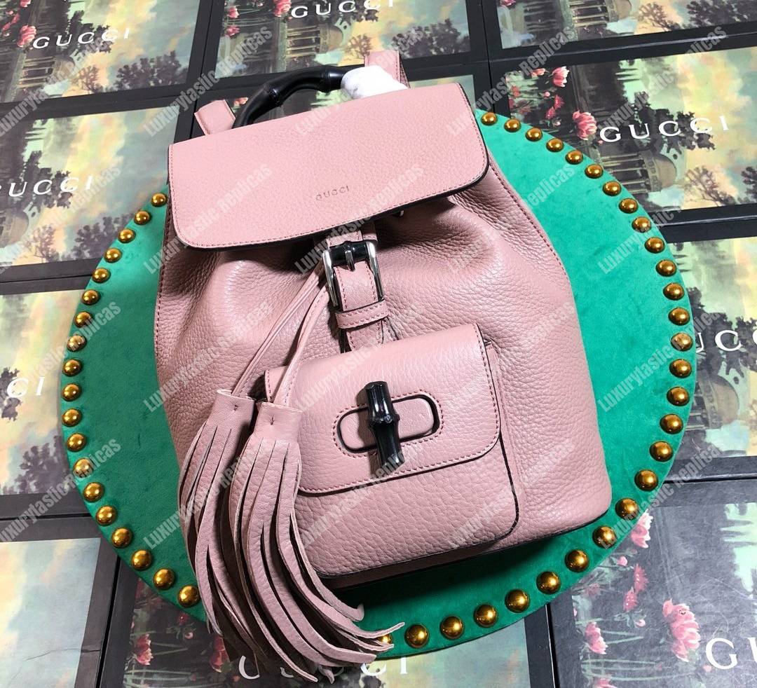 G*u*i leather bamboo tassel mini backpack magnolia