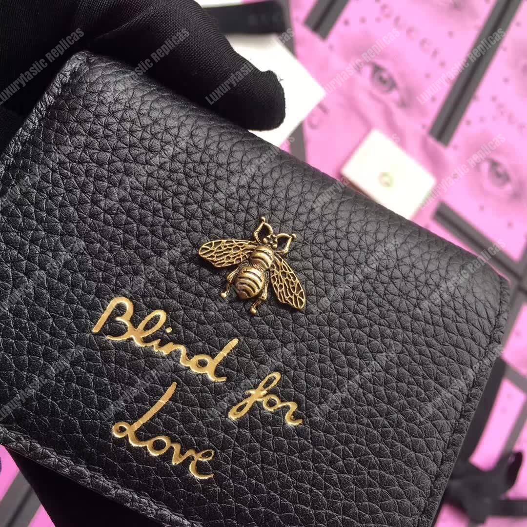 G*u*i animalier card case black with bee