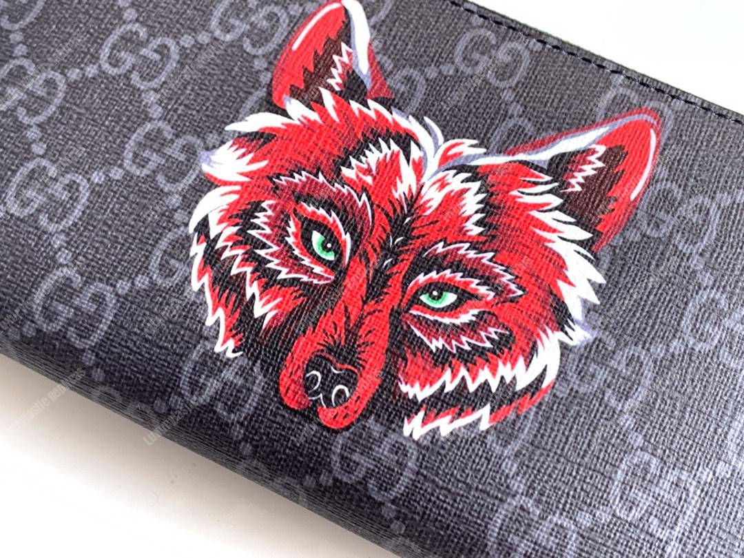 G*u*i gg sup*e zip around wallet with wolf