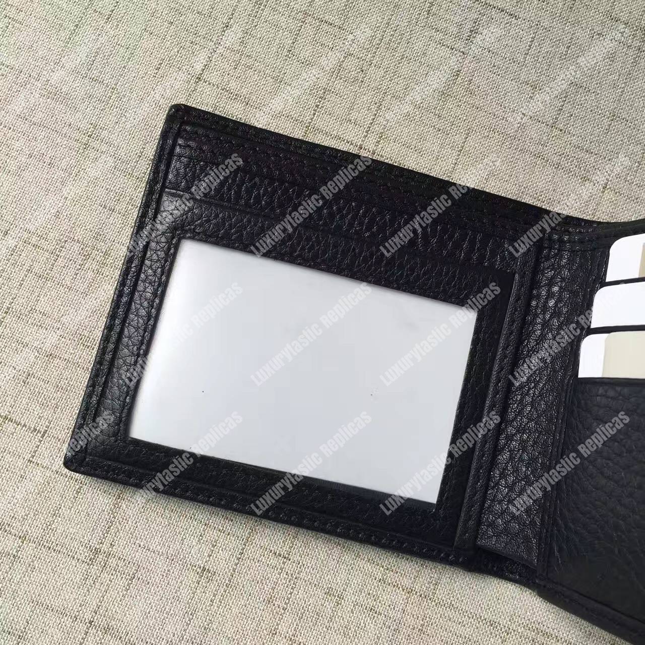 G*u*i leather bi-fold wallet black