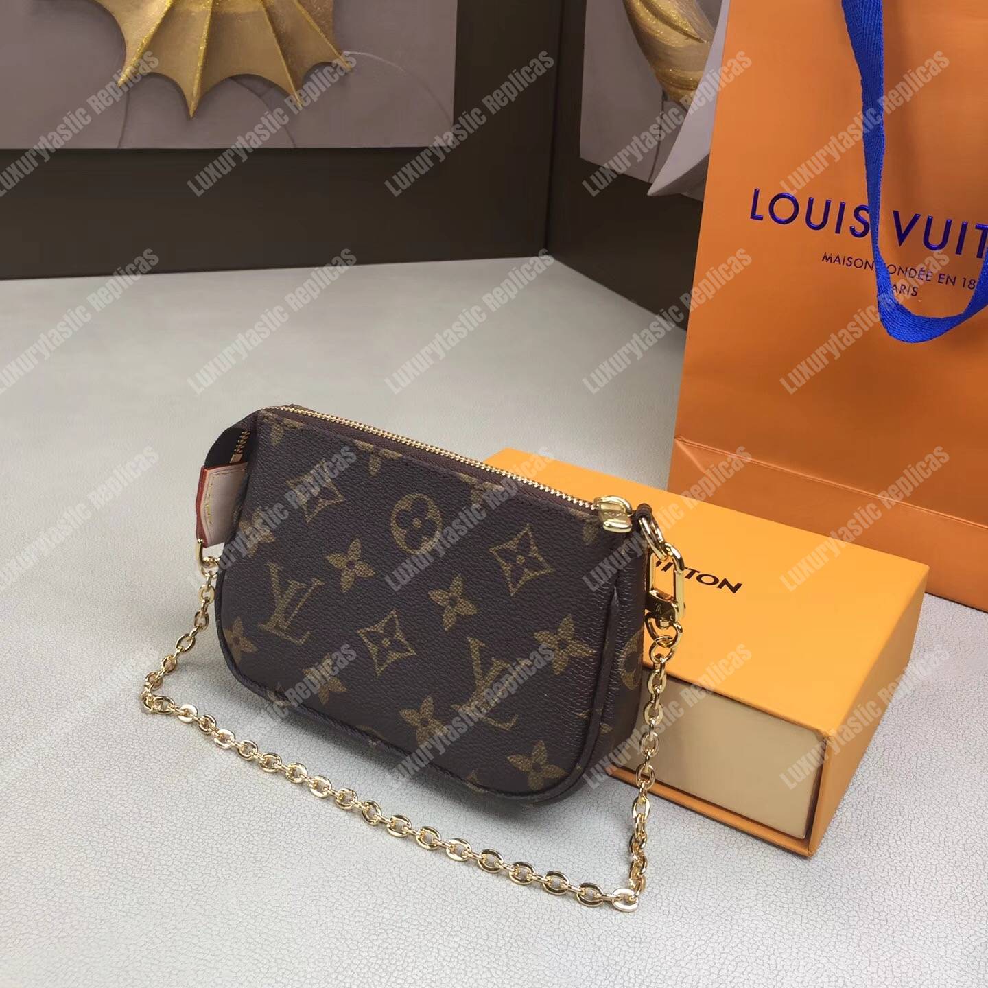 LV Mini Pochette Accessoires Monogram