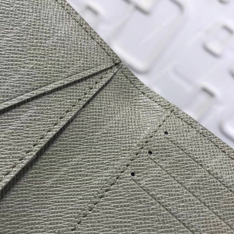 LV Pocket Organizer Taiga Leather Silver