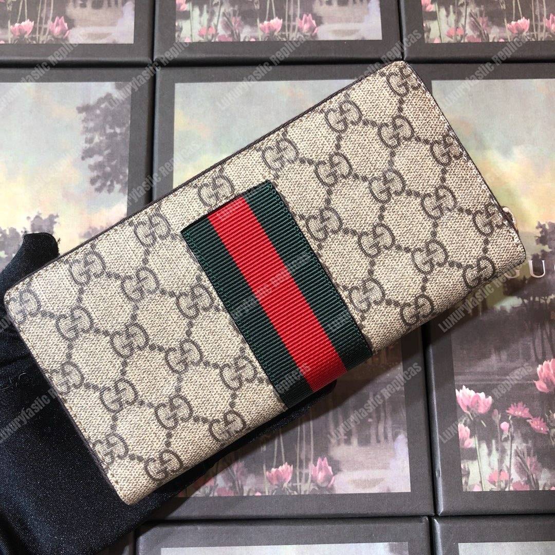 G*u*i web gg sup*e zip around wallet bee