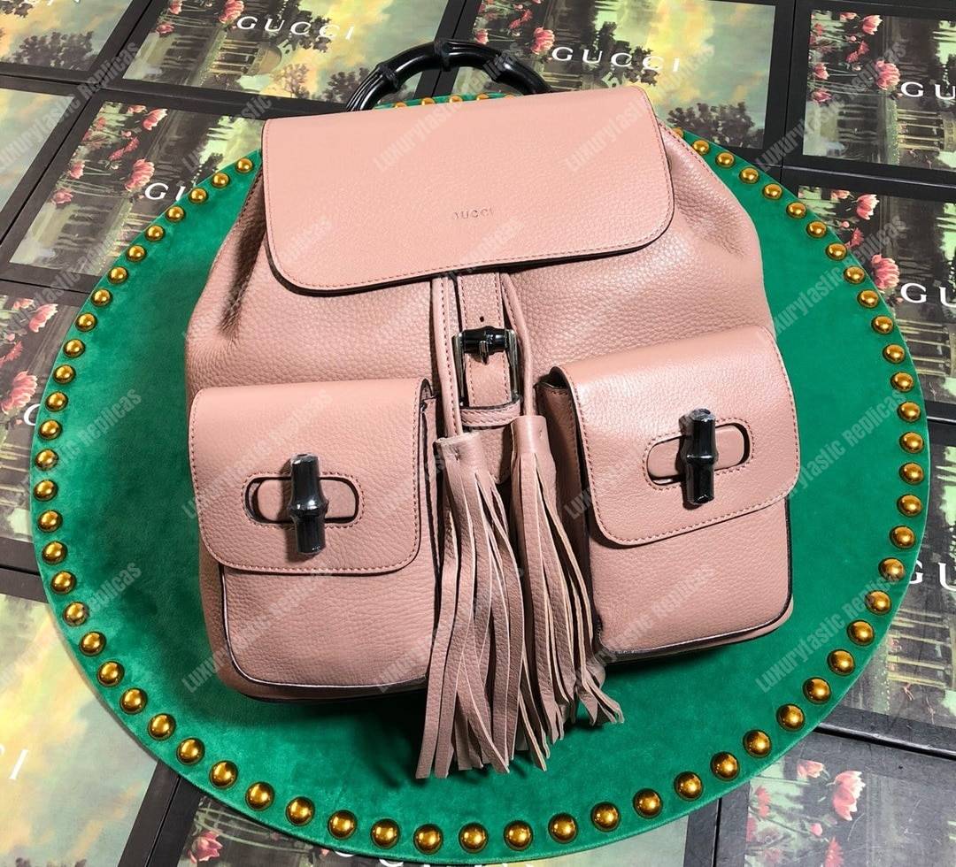 G*u*i leather bamboo tassel backpack magnolia