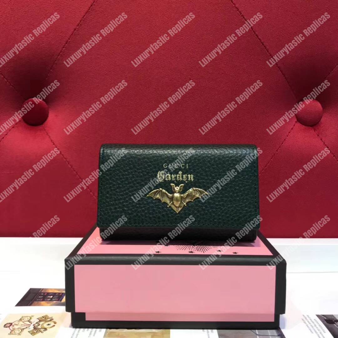 G*u*i garden leather key case green with bat