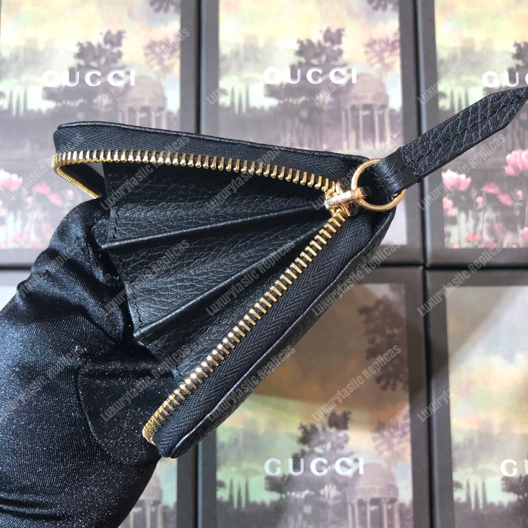 G*u*i leather zip around wallet black