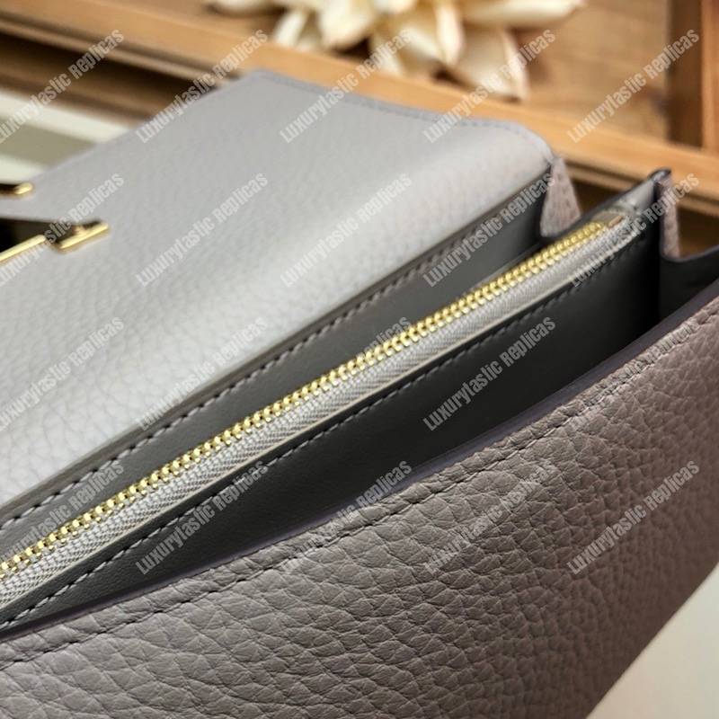 LV Capucines Wallet Taurillon Galet