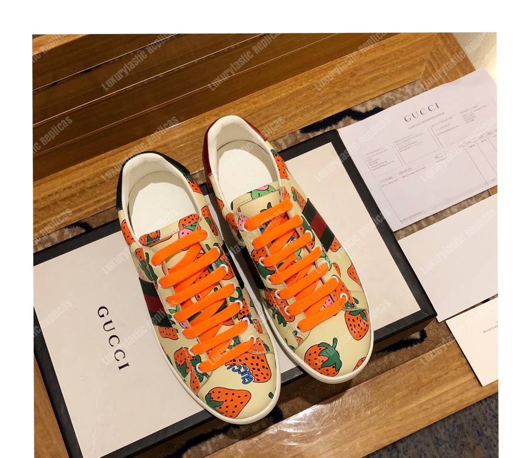 G*u*i ace sneaker with G*u*i strawberry print