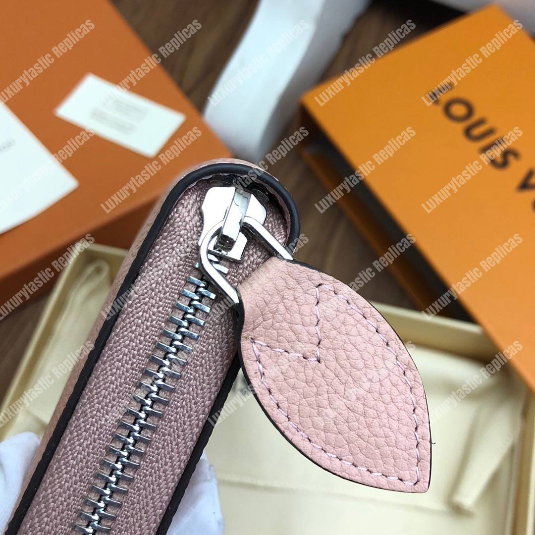 LV Zippy Wallet Mahina Leather Creme