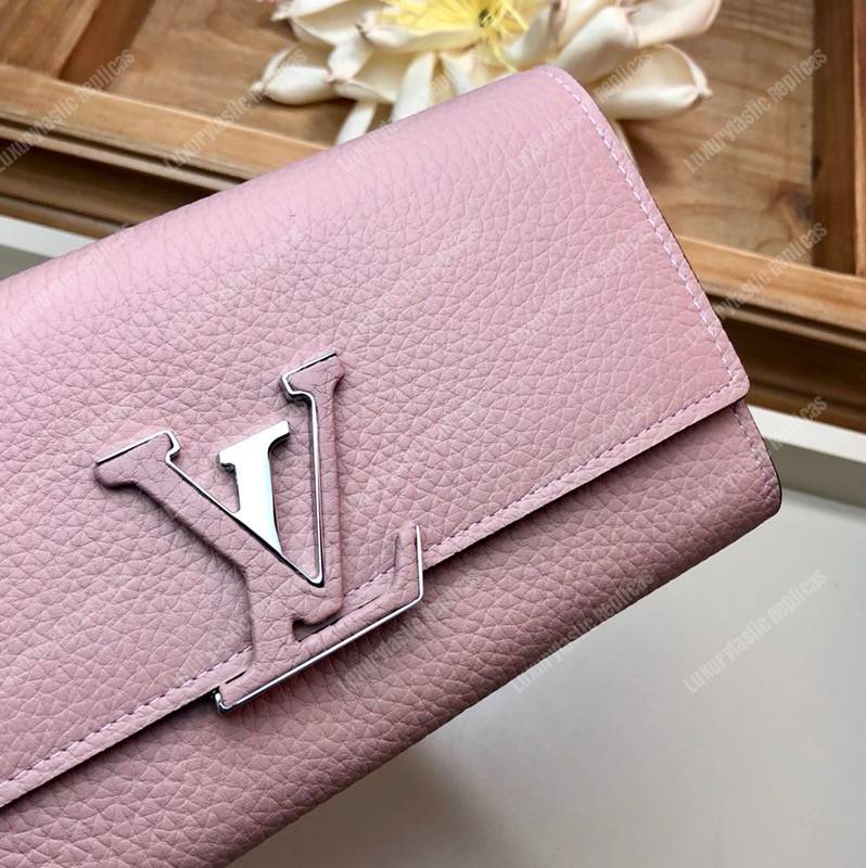 LV Capucines Wallet Taurillon Magnolia