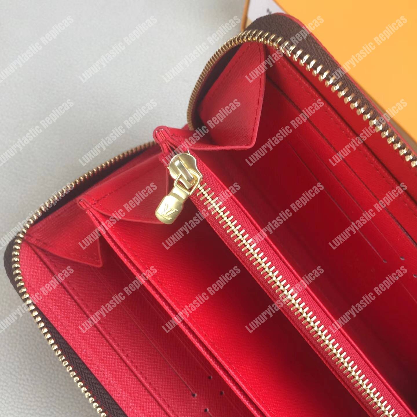 LV Zippy Wallet Damier Ebene Gold Studs
