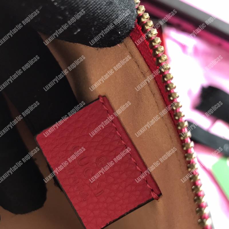 G*u*i leather pouch with butterfly red