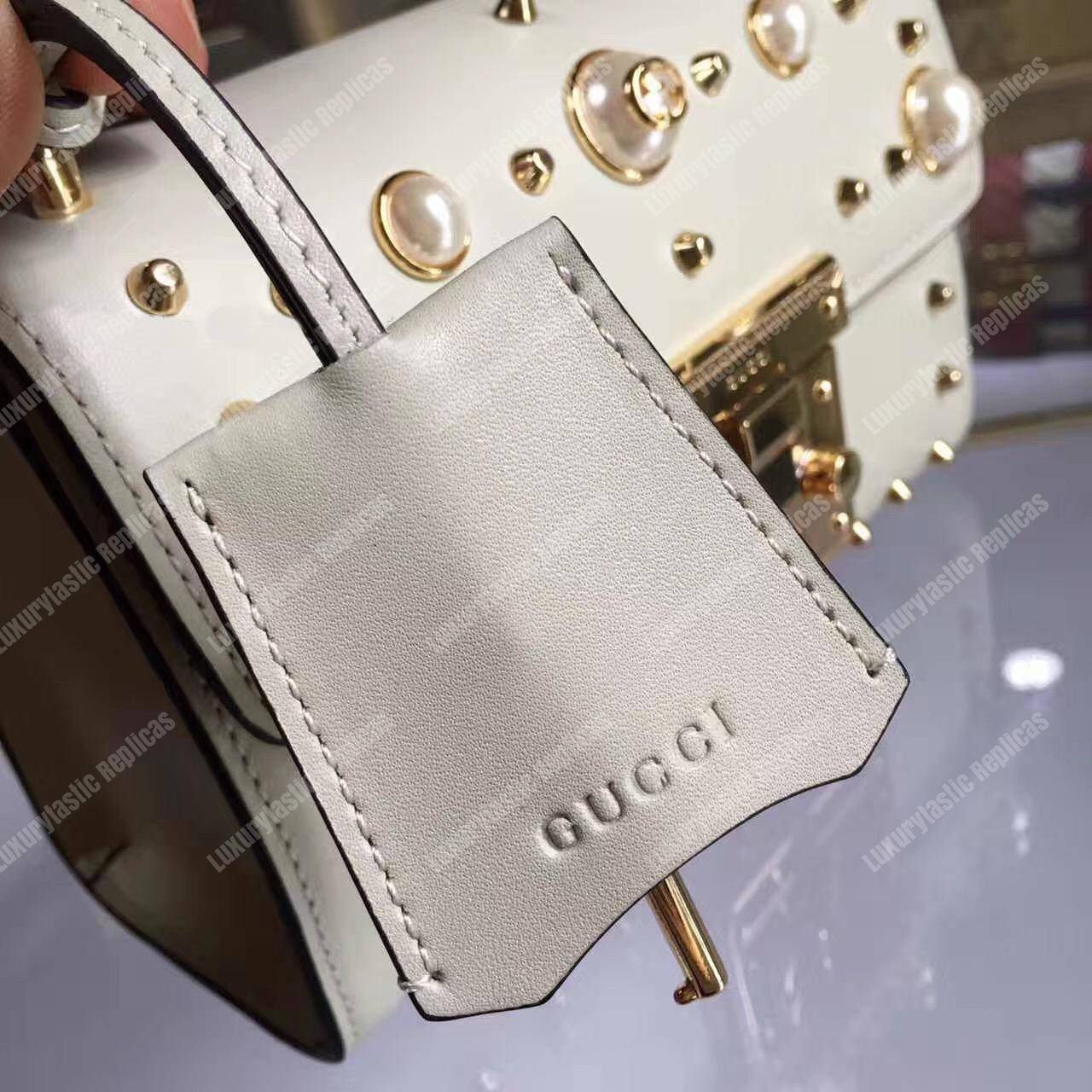 G*u*i padlock shoulder bag white with pearls