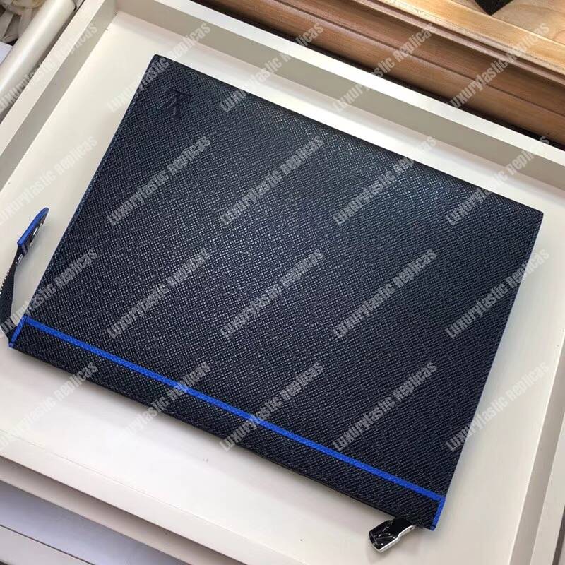 LV Pochette Voyage Taiga Leather