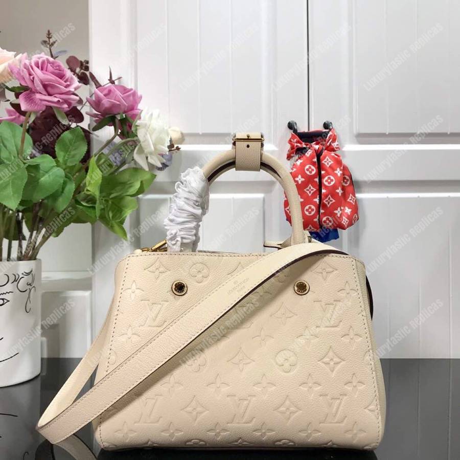 LV Montaigne BB Monogram Empreinte Leather Crème