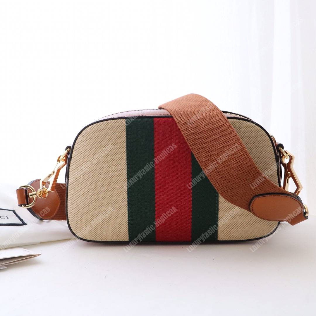 G*u*i vintage canvas shoulder bag