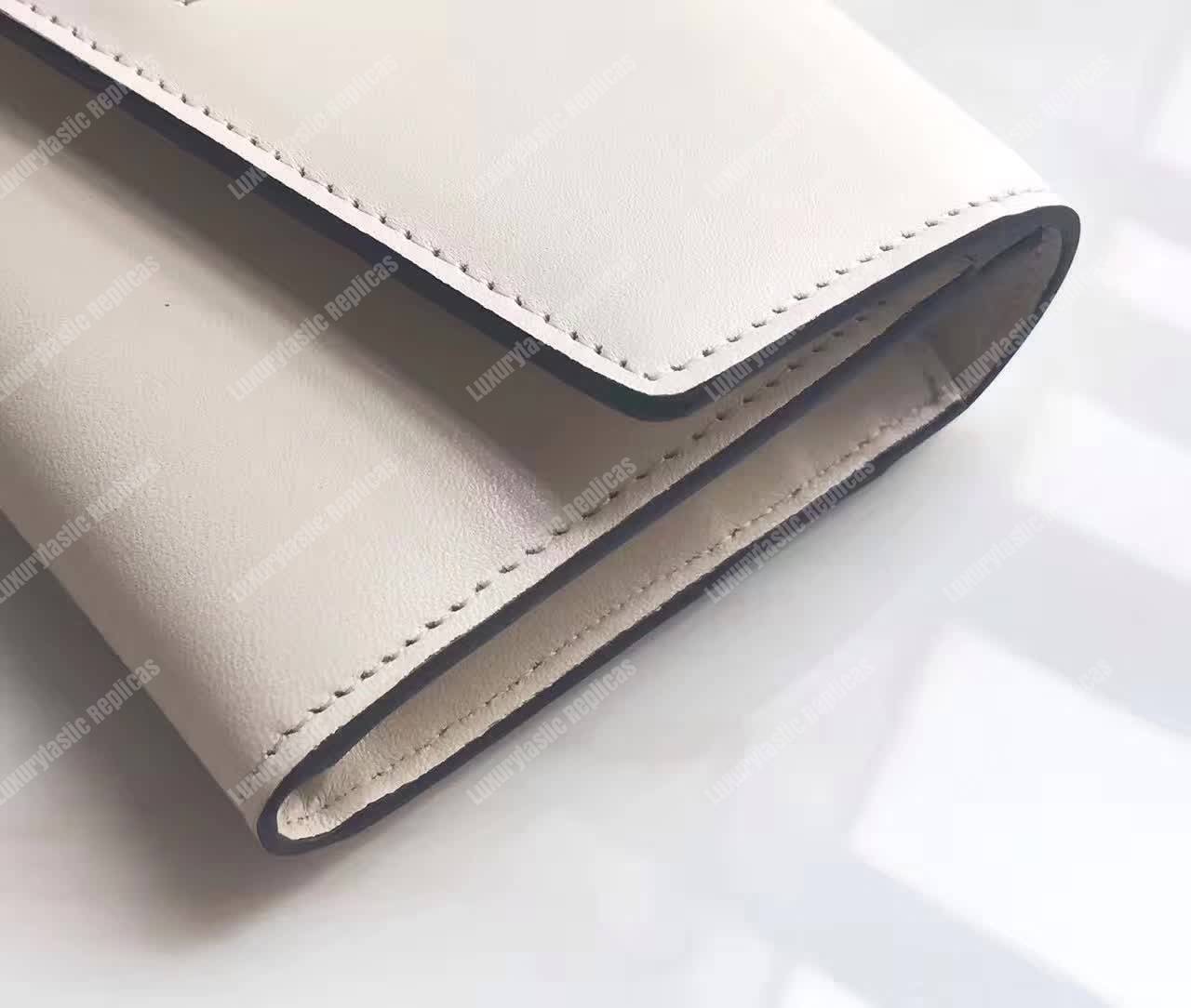 G*u*i sylvie leather continental wallet white