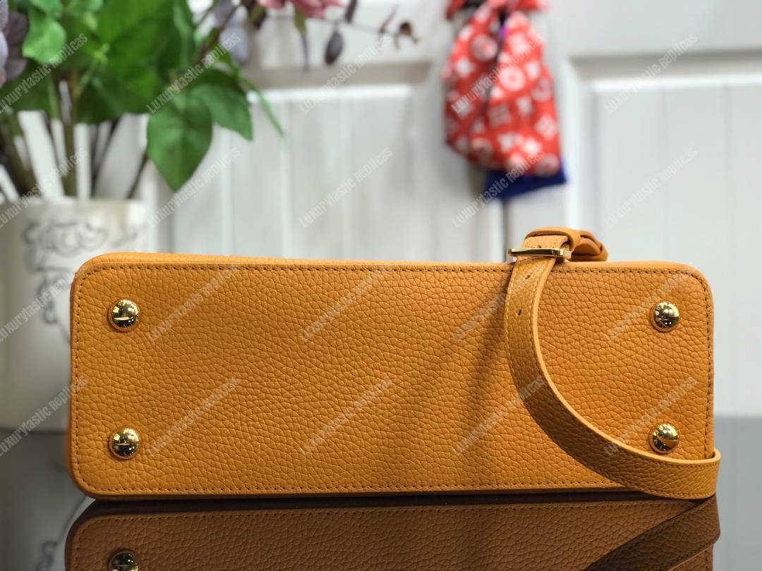 LV Capucines PM Taurillon Leather Ocre