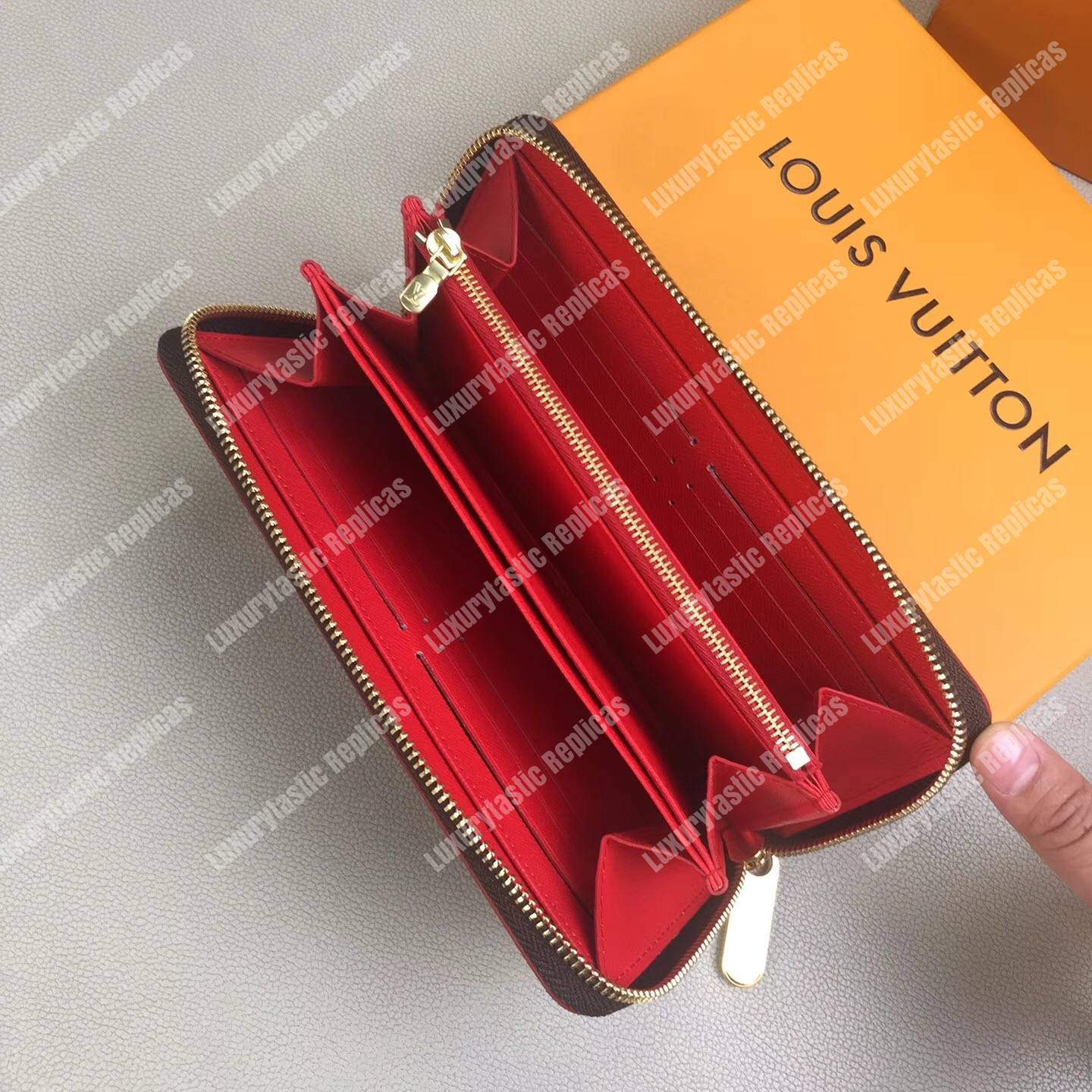 LV Zippy Wallet Damier Ebene Gold Studs