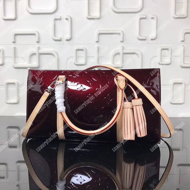 LV Neo Triangle Vernis Leather Amarante