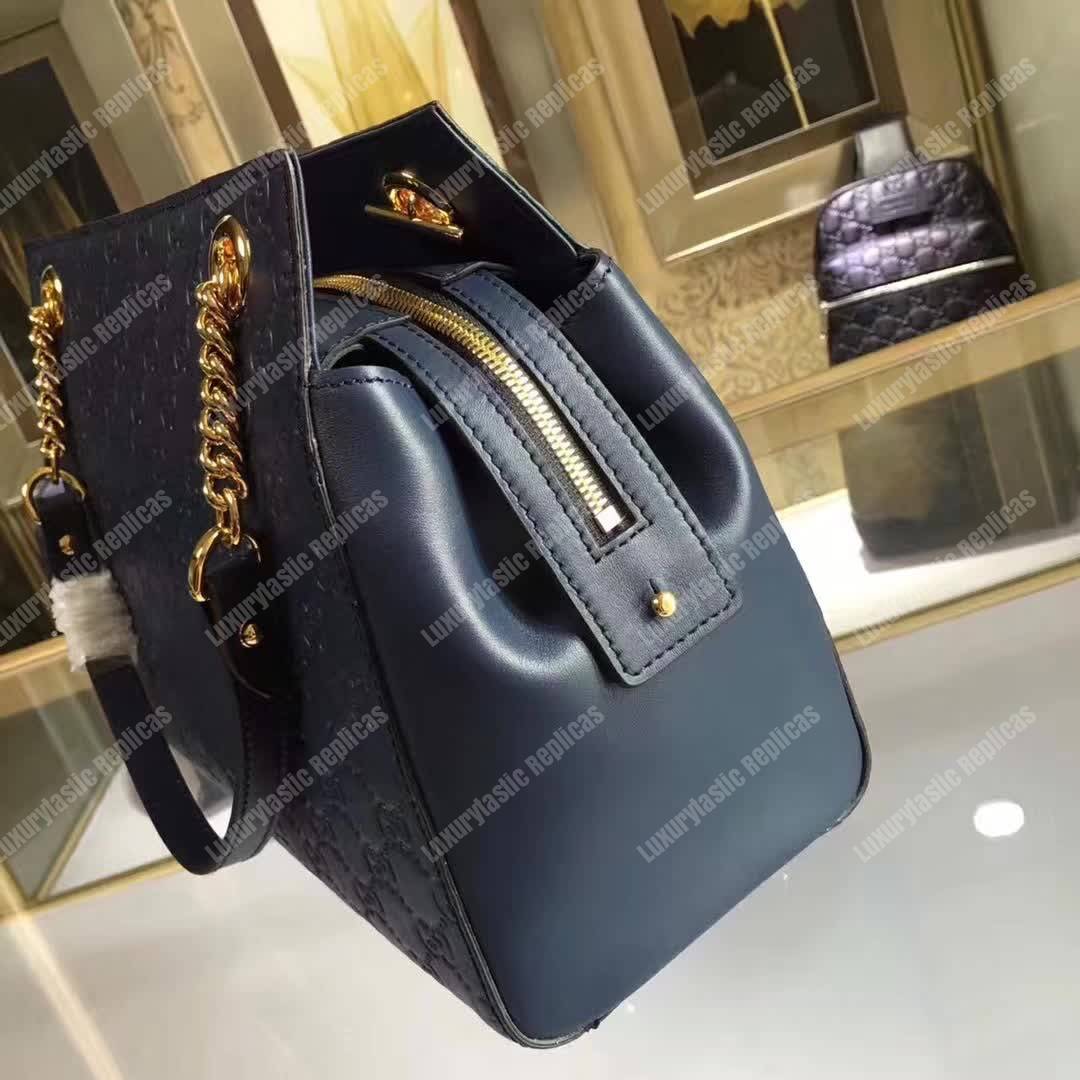 G*u*i signature medium top handle bag blue