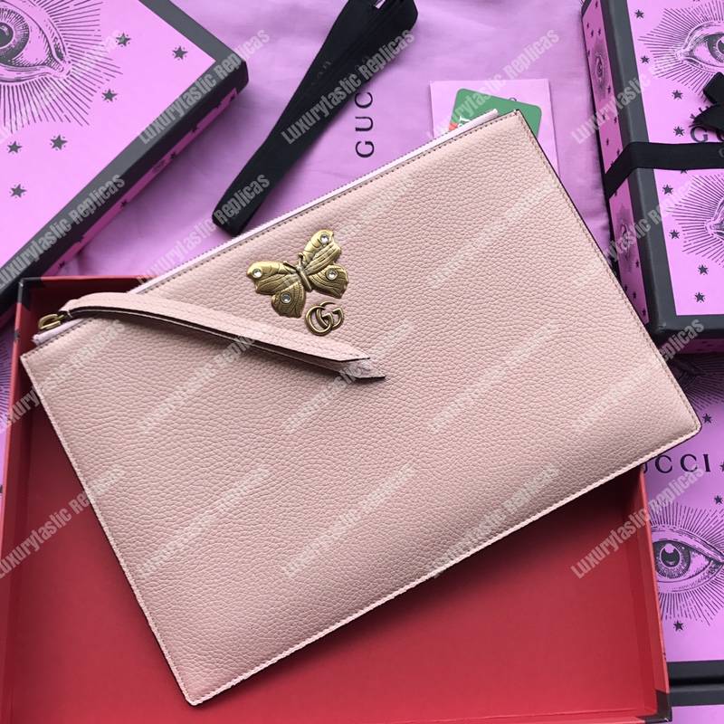 G*u*i leather pouch with butterfly pink