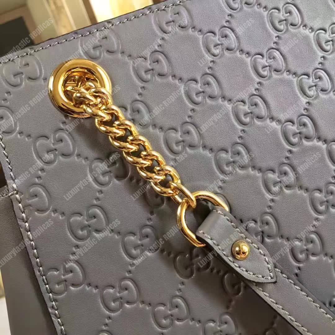 G*u*i signature medium top handle bag gray