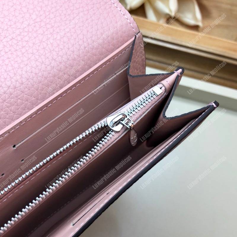 LV Capucines Wallet Taurillon Magnolia