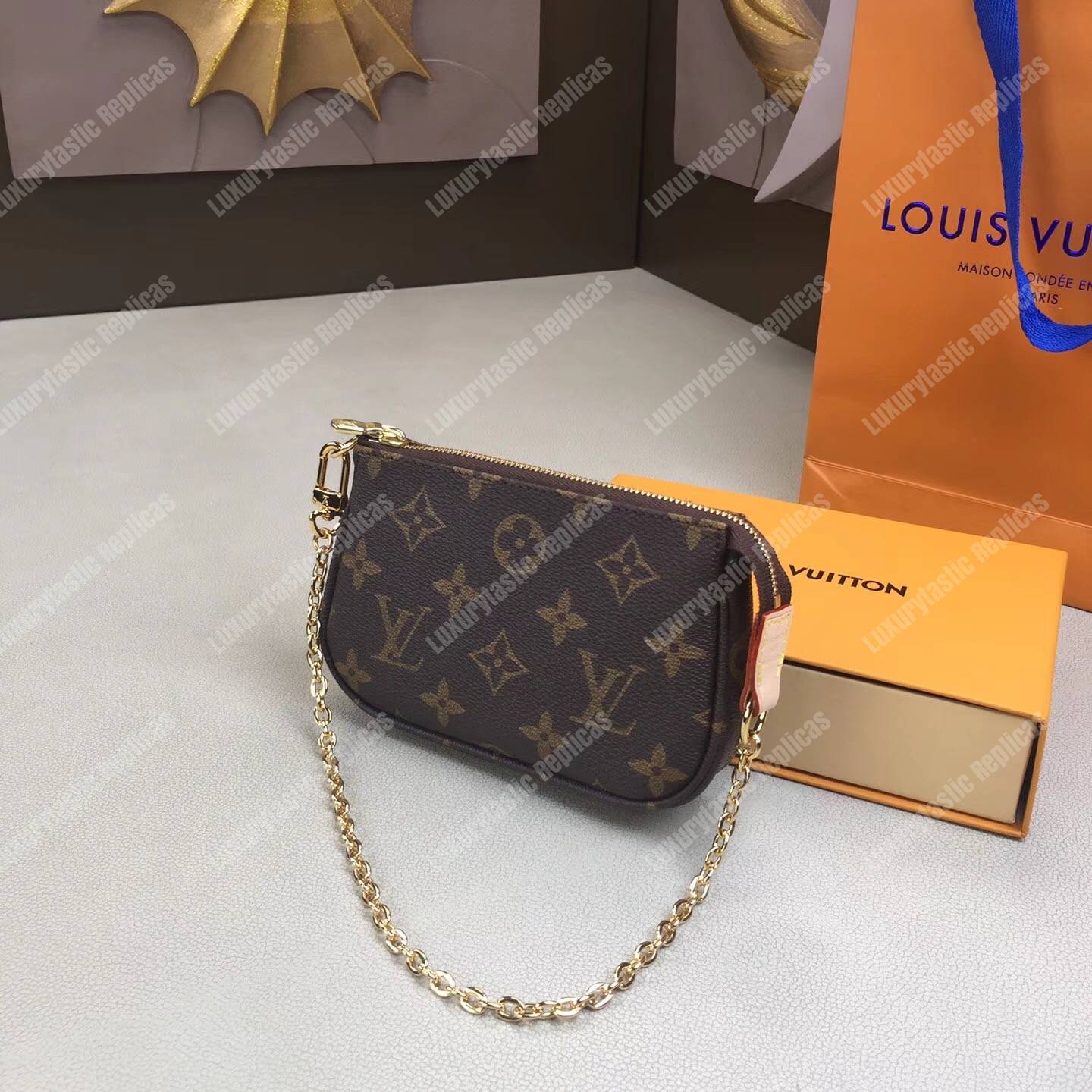 LV Mini Pochette Accessoires Monogram