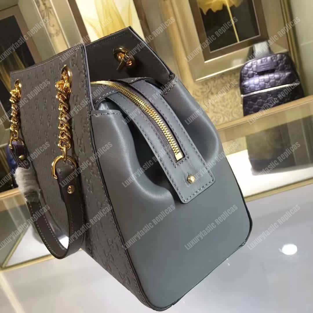 G*u*i signature medium top handle bag gray
