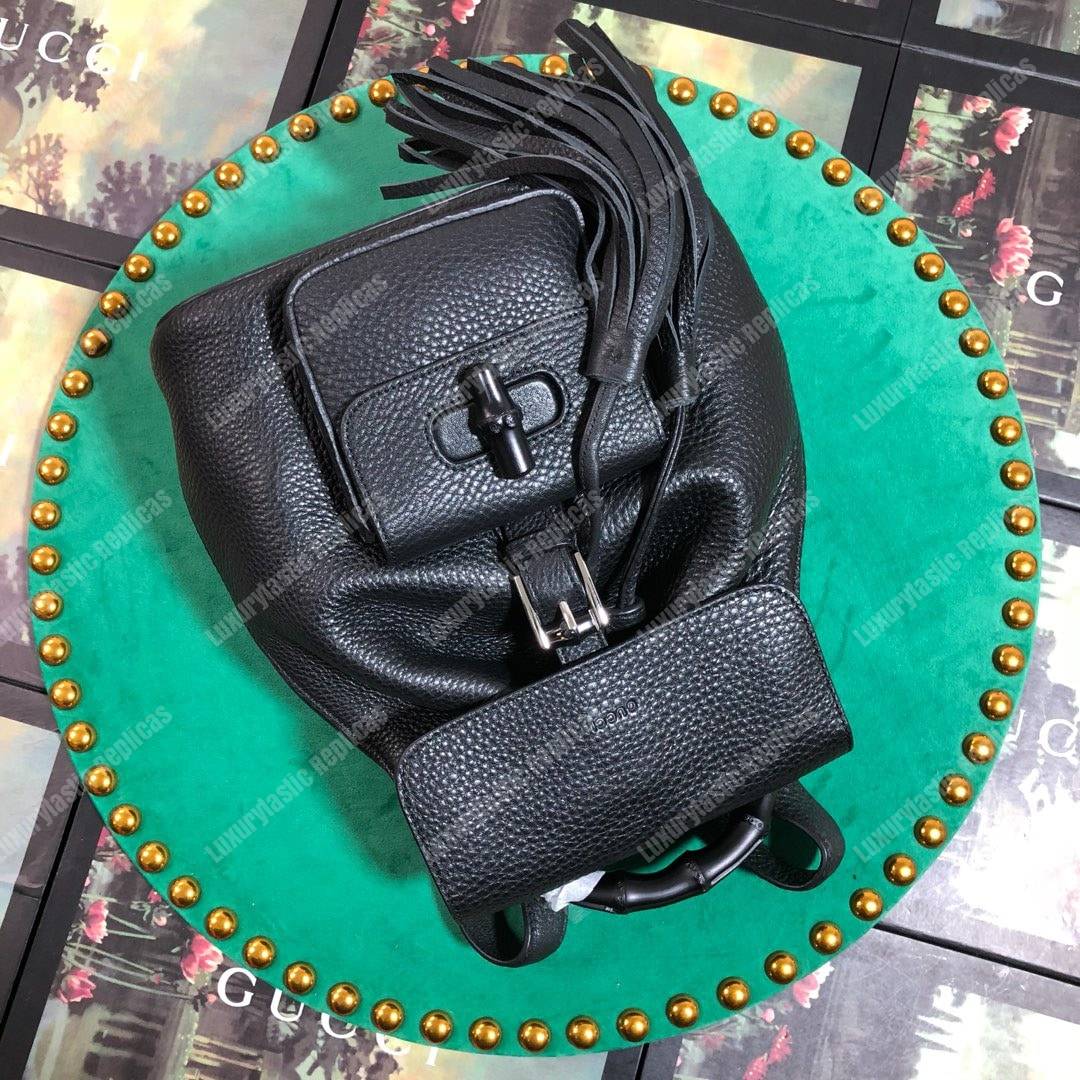 G*u*i leather bamboo tassel mini backpack black