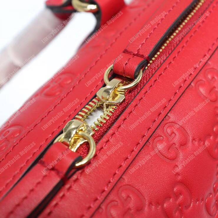 G*u*i signature medium top handle bag red