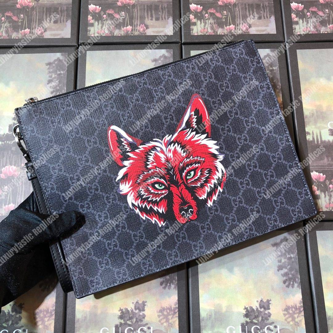 G*u*i gg sup*e pouch with wolf