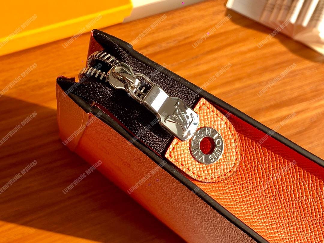LV Pochette Voyage MM Orange