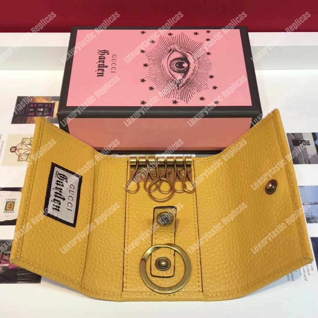 G*u*i garden leather key case yellow with bat