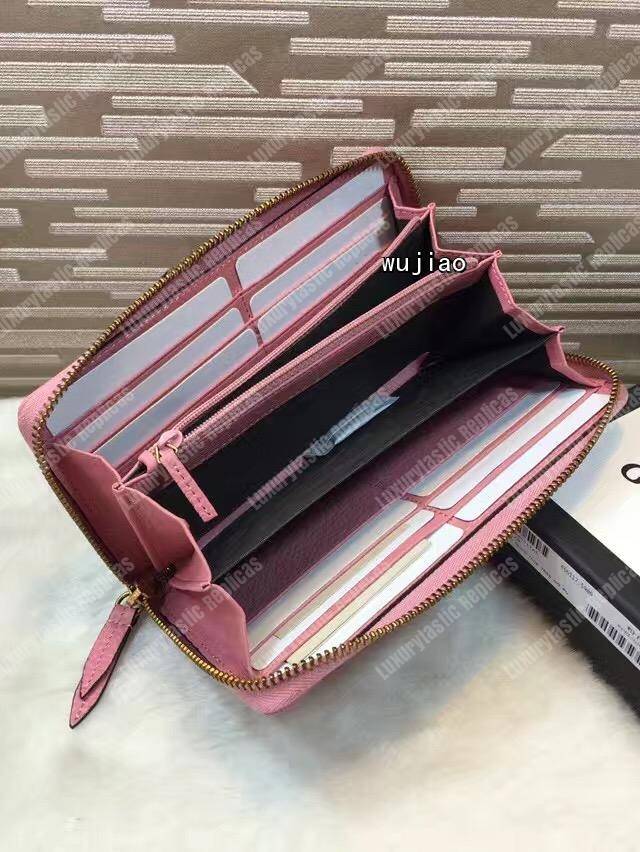 G*u*i gg leather zip around wallet pink