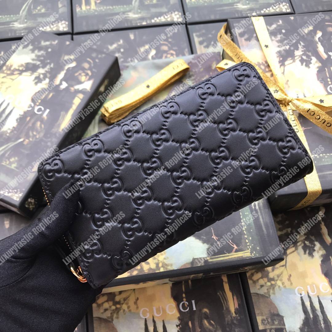 G*u*i signature zip around leather wallet black