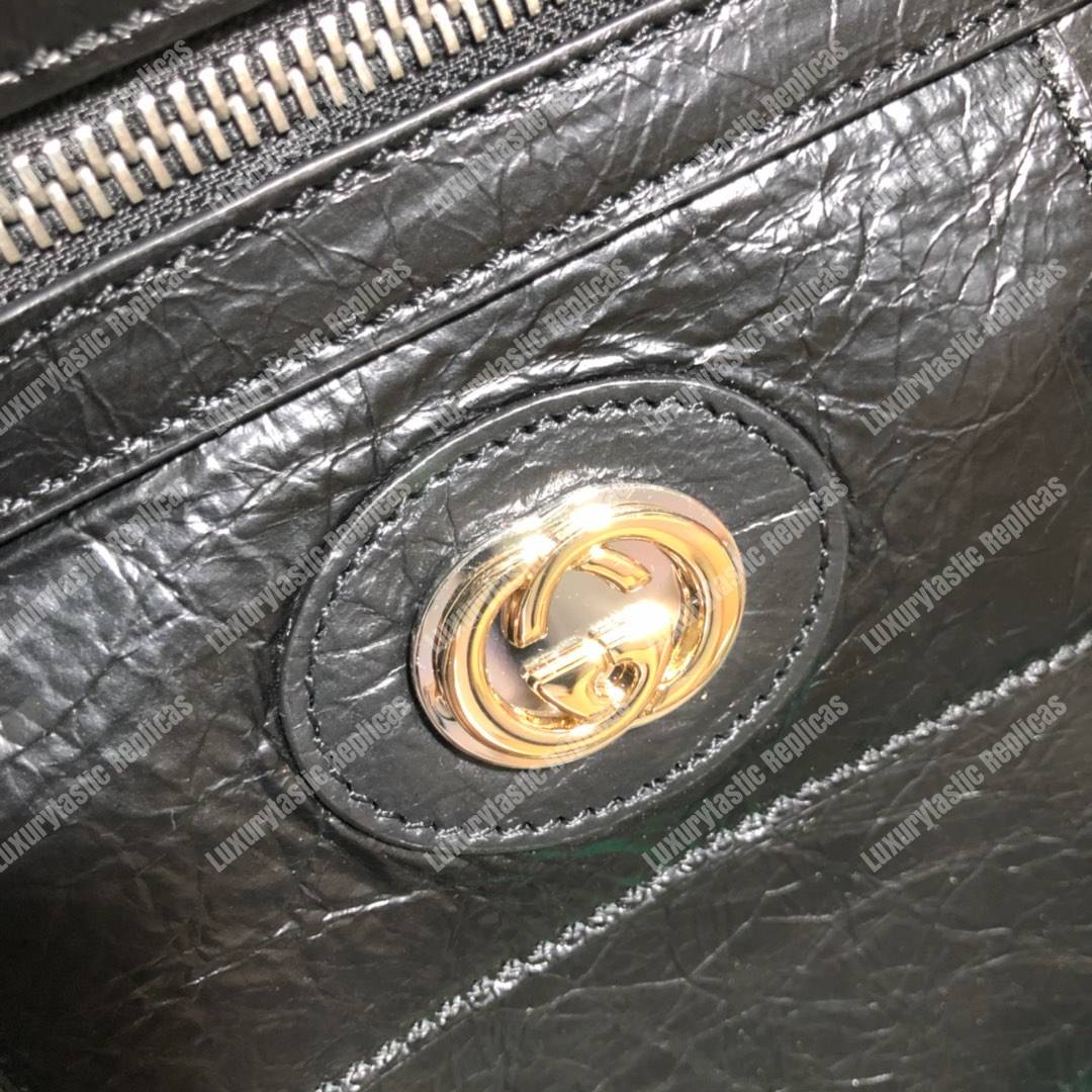 G*u*i medium soft leather messenger bag black