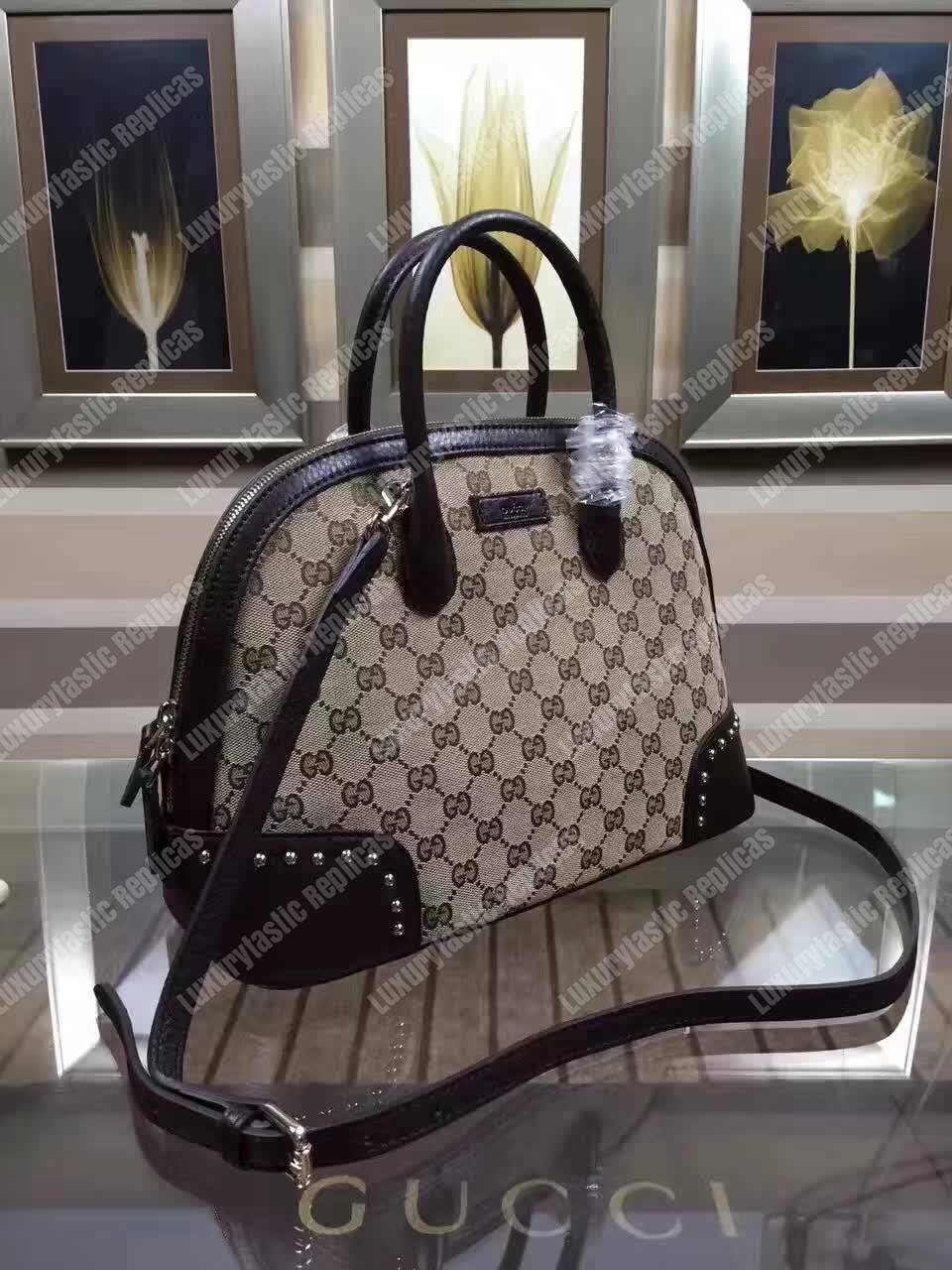 G*u*i gg canvas top handle bag black