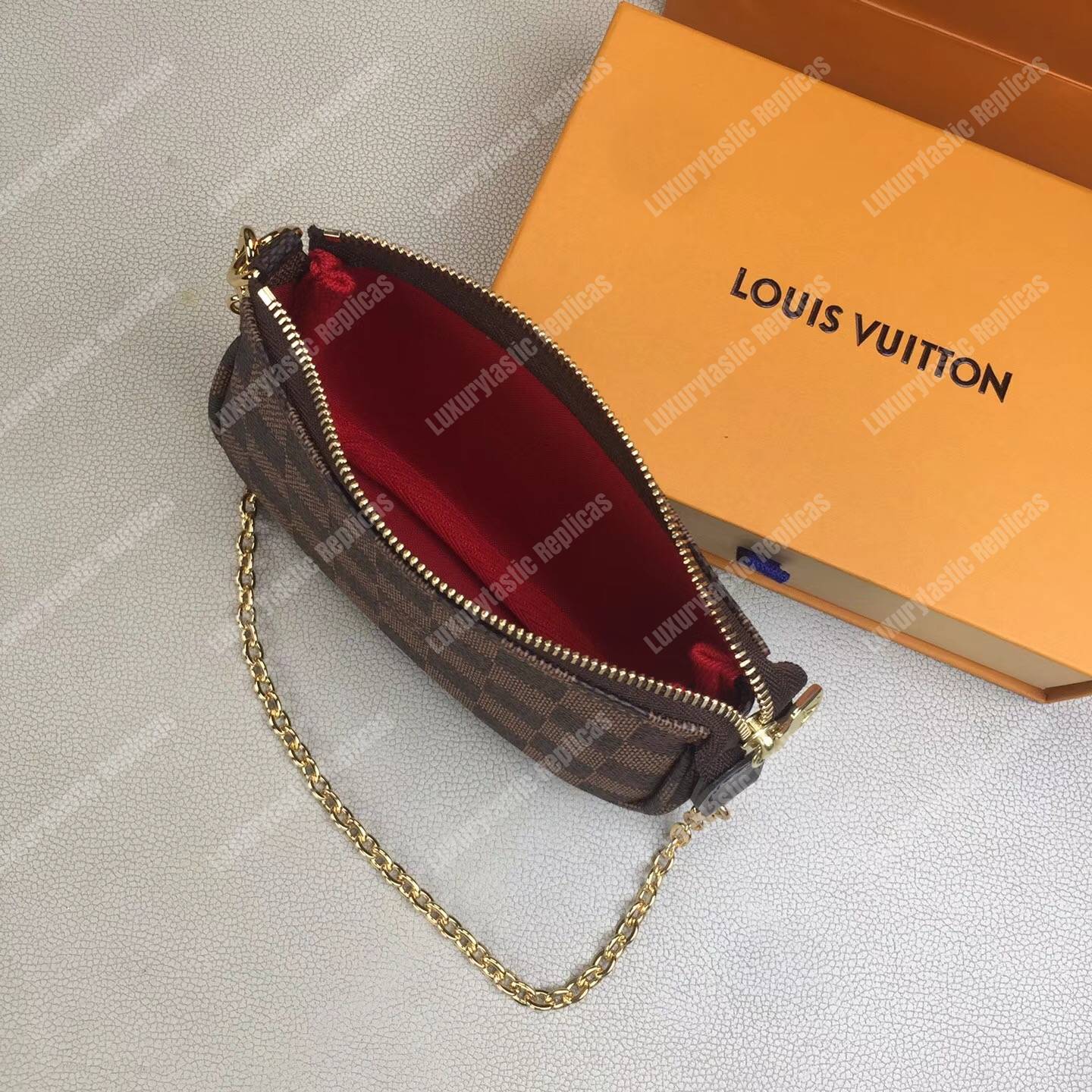 LV Mini Pochette Accessoires Damier Ebene