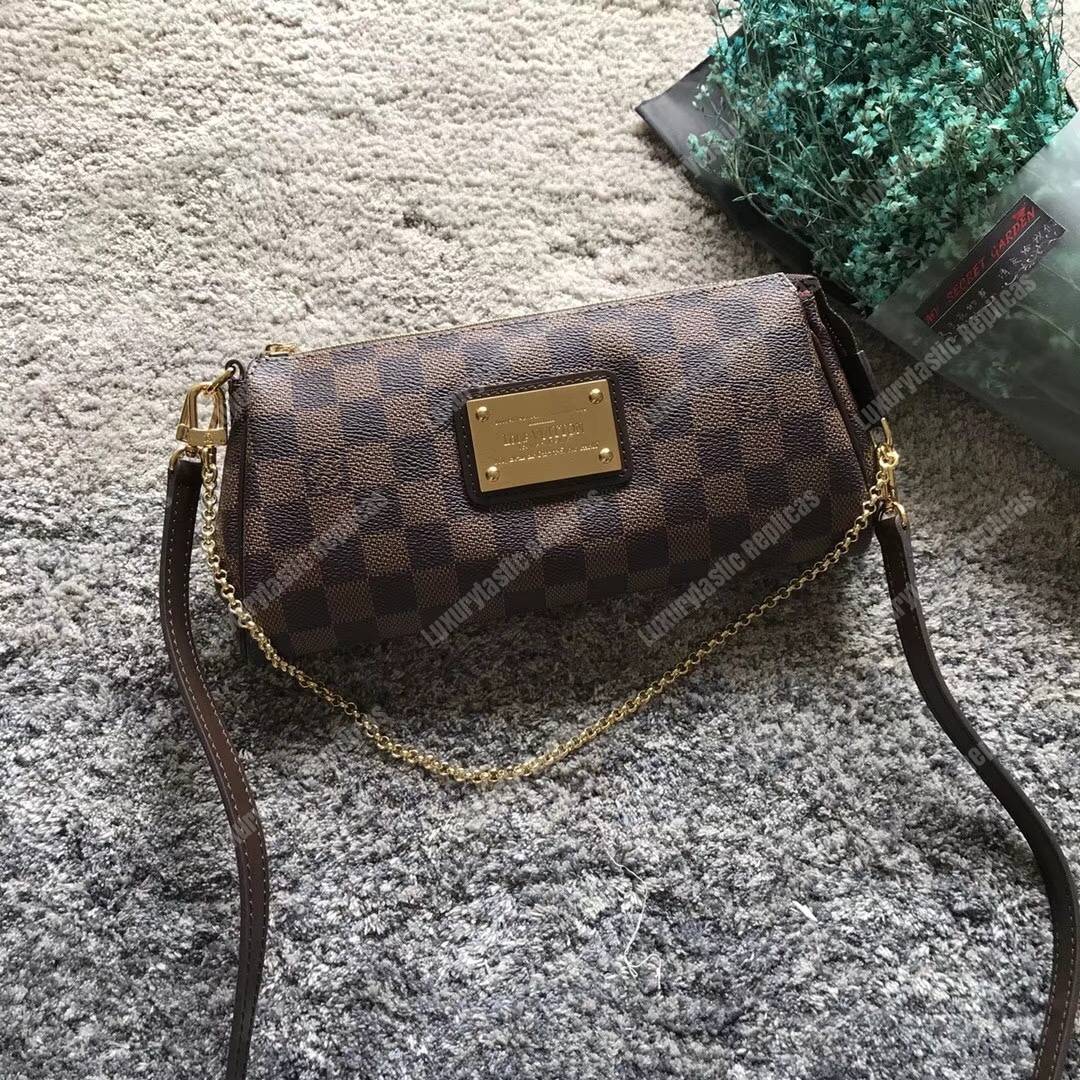 LV Eva Clutch Damier Ebene Canvas