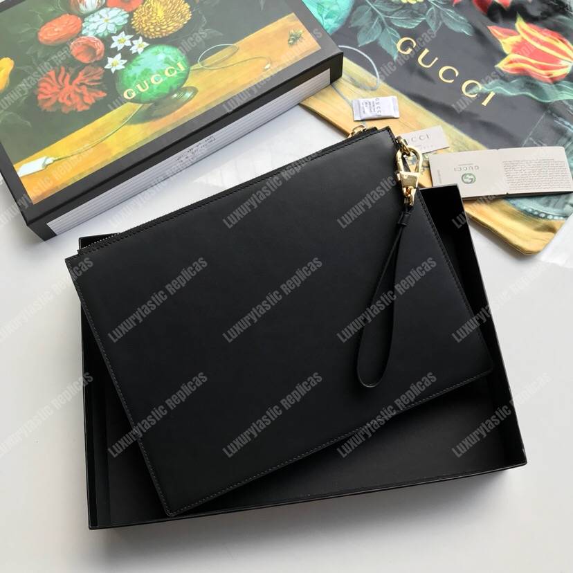 G*u*i leather pouch with G*u*i logo