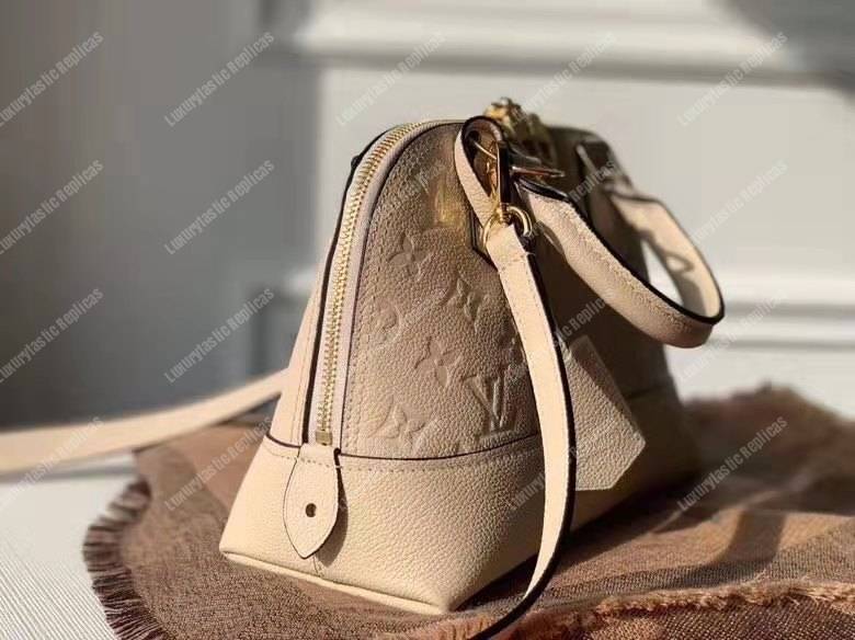 LV Neo Alma PM Monogram Empreinte Creme