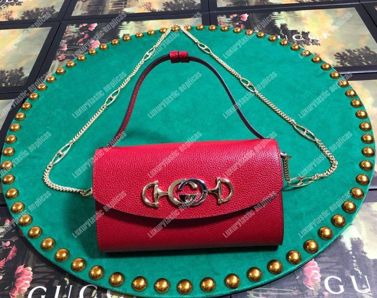 G*u*i zumi hibiscus red smooth leather mini bag