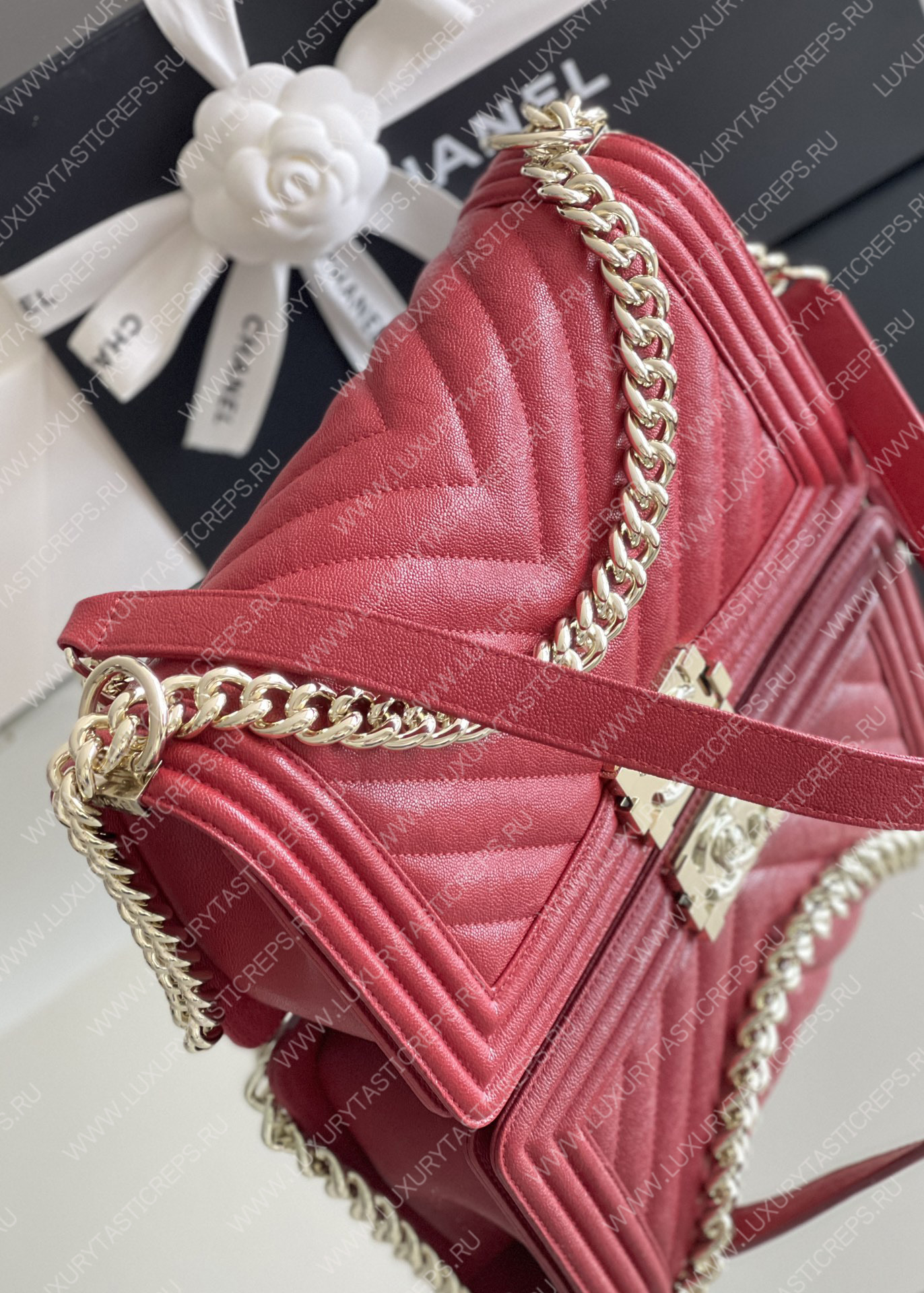 Ch*el boy handbag red a67086