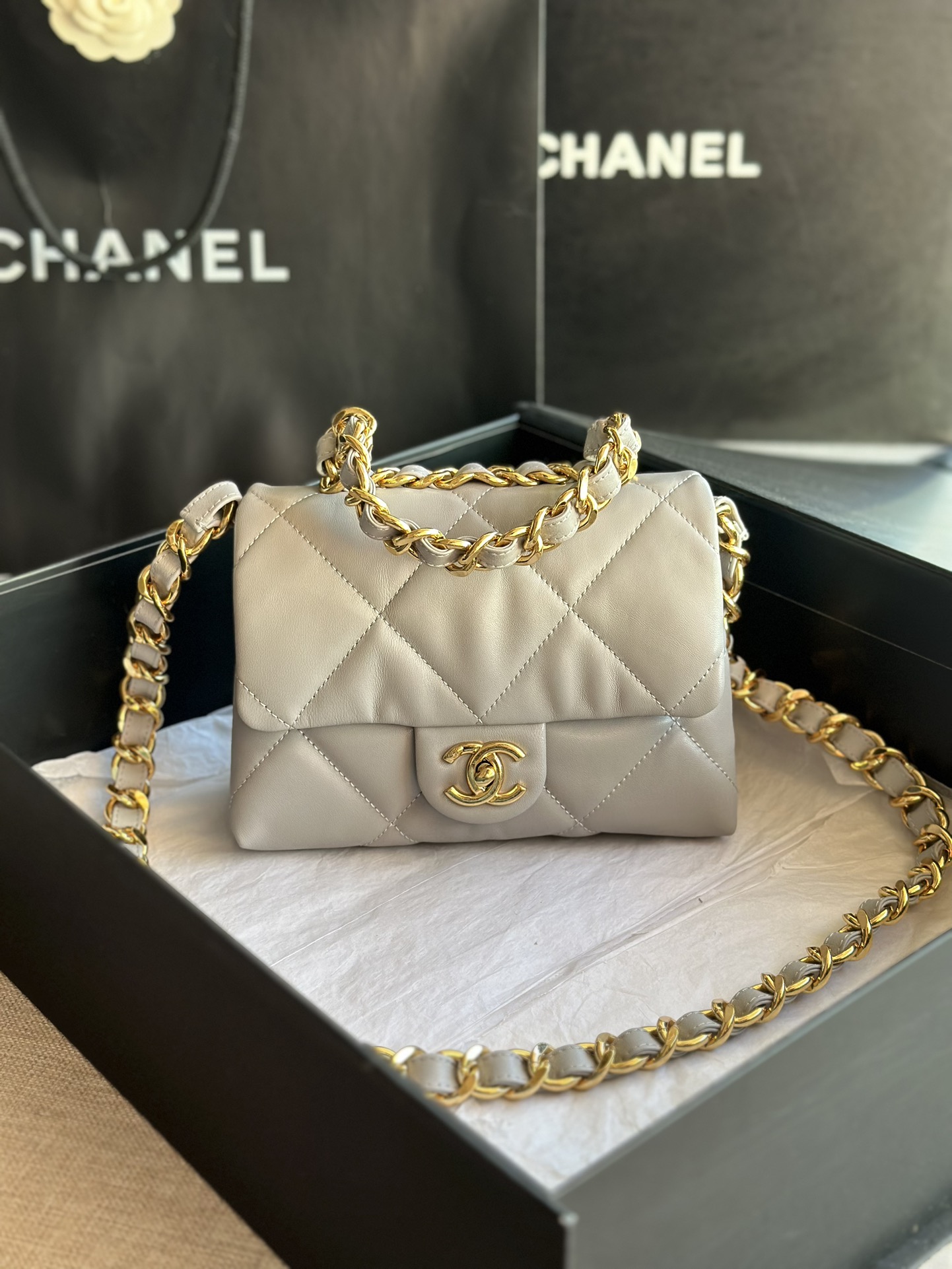 Ch*el pearl crush mini flap bag white as1160